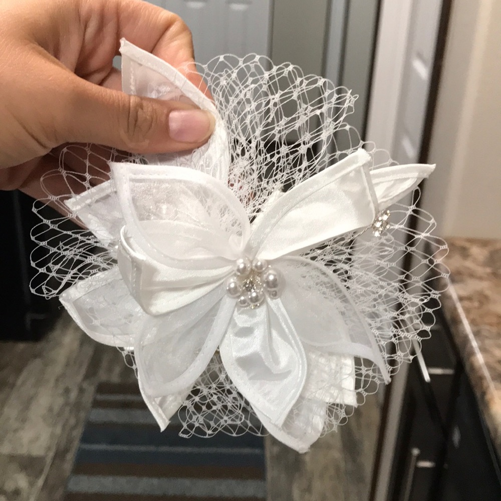 Wedding hair pieces and a Coach watch